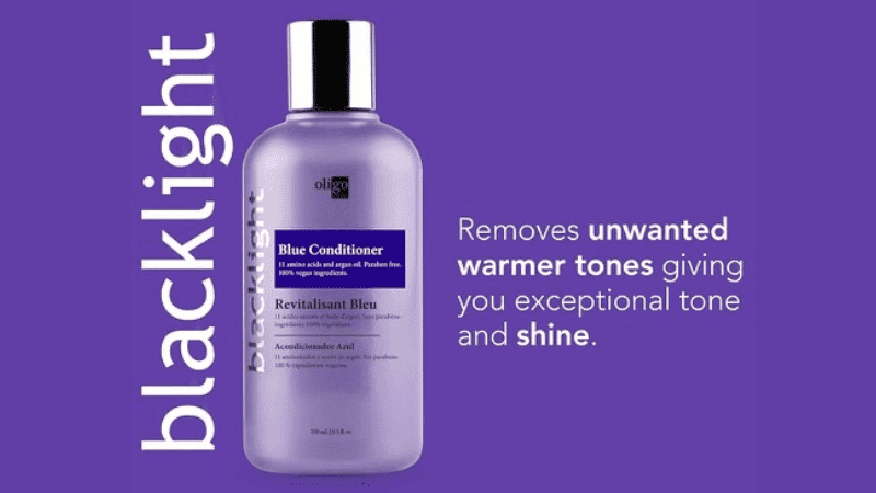 Purple bottle of Oligo Blue Conditioner, with text about removing unwanted warm tones and adding shine.