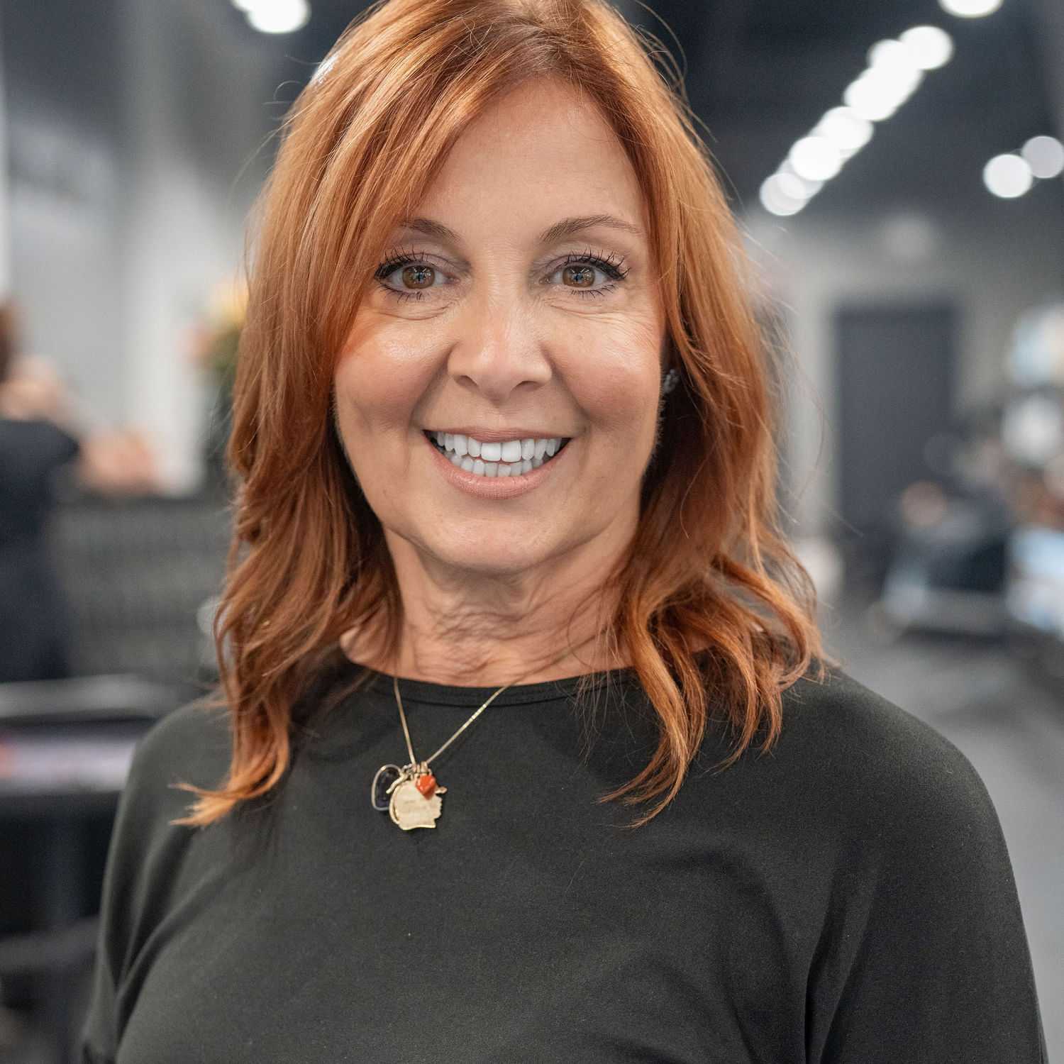 Portrait of Vicki Scott, a professional stylist at Jason Matthew Salon, showcasing their expertise and style.