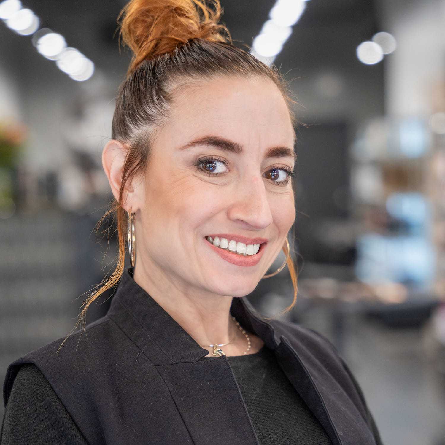 Portrait of Nicole Nagle, a professional stylist at Jason Matthew Salon, showcasing their expertise and style.