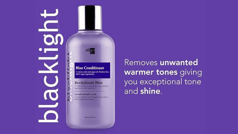 Purple bottle of Oligo Blue Conditioner, with text about removing unwanted warm tones and adding shine.