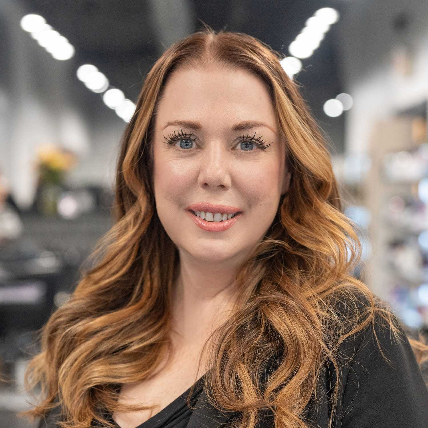 Portrait of Judy Taraborelli, a professional stylist at Jason Matthew Salon, showcasing their expertise and style.