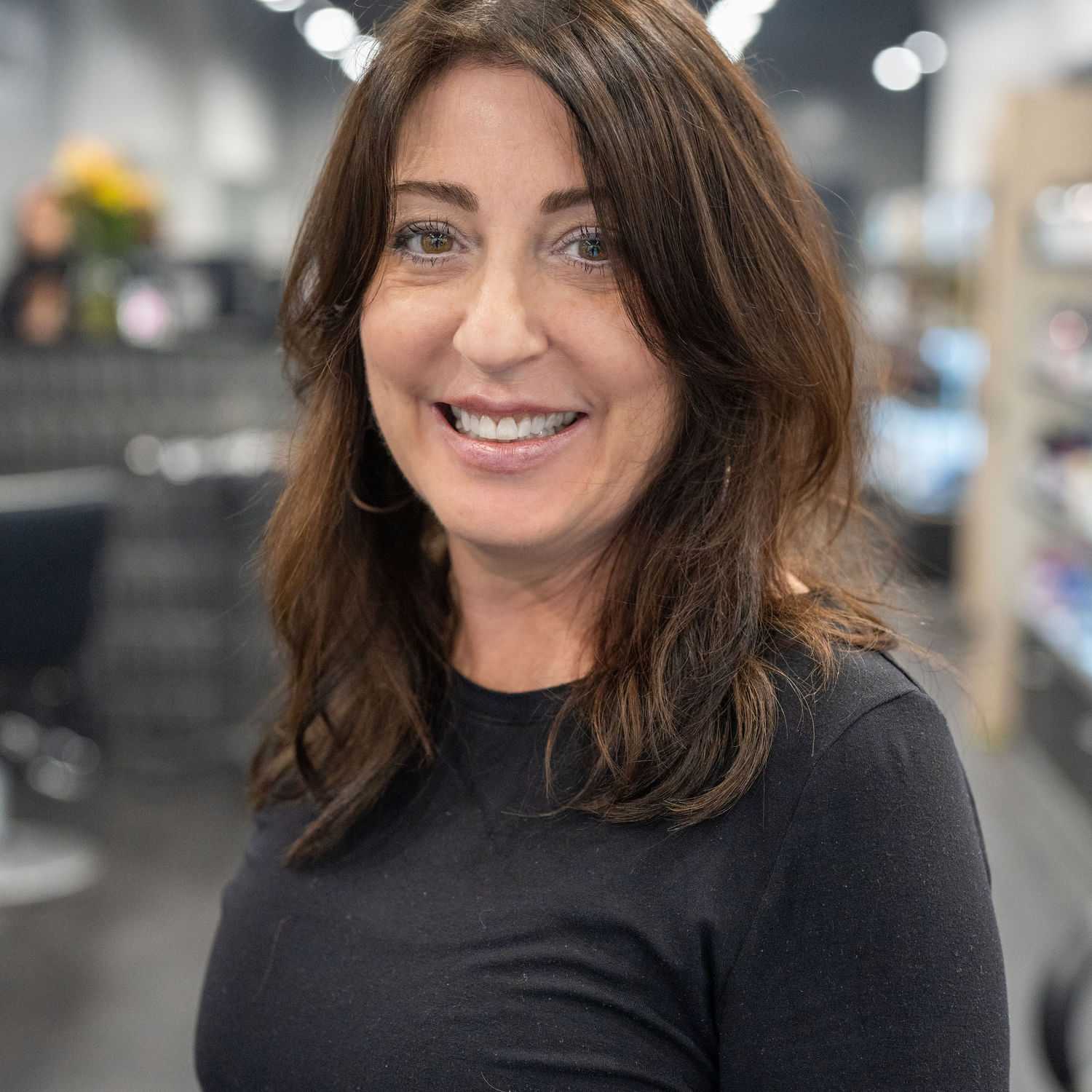 Portrait of Kathy Panetta, a professional stylist at Jason Matthew Salon, showcasing their expertise and style.