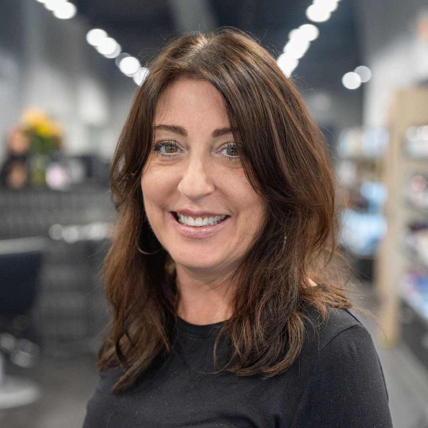 Portrait of Kathy Panetta, a professional stylist at Jason Matthew Salon, showcasing their expertise and style.