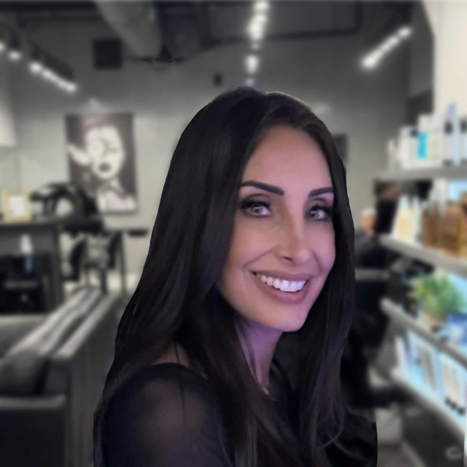 Portrait of Julie Kate, a professional stylist at Jason Matthew Salon, showcasing their expertise and style.