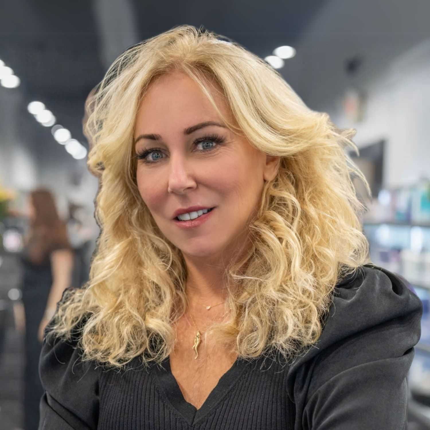 Portrait of Renee Iannace, a professional stylist at Jason Matthew Salon, showcasing their expertise and style.