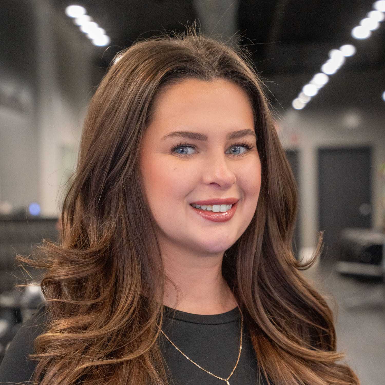 Portrait of Jacqueline Verratti, a professional stylist at Jason Matthew Salon, showcasing their expertise and style.