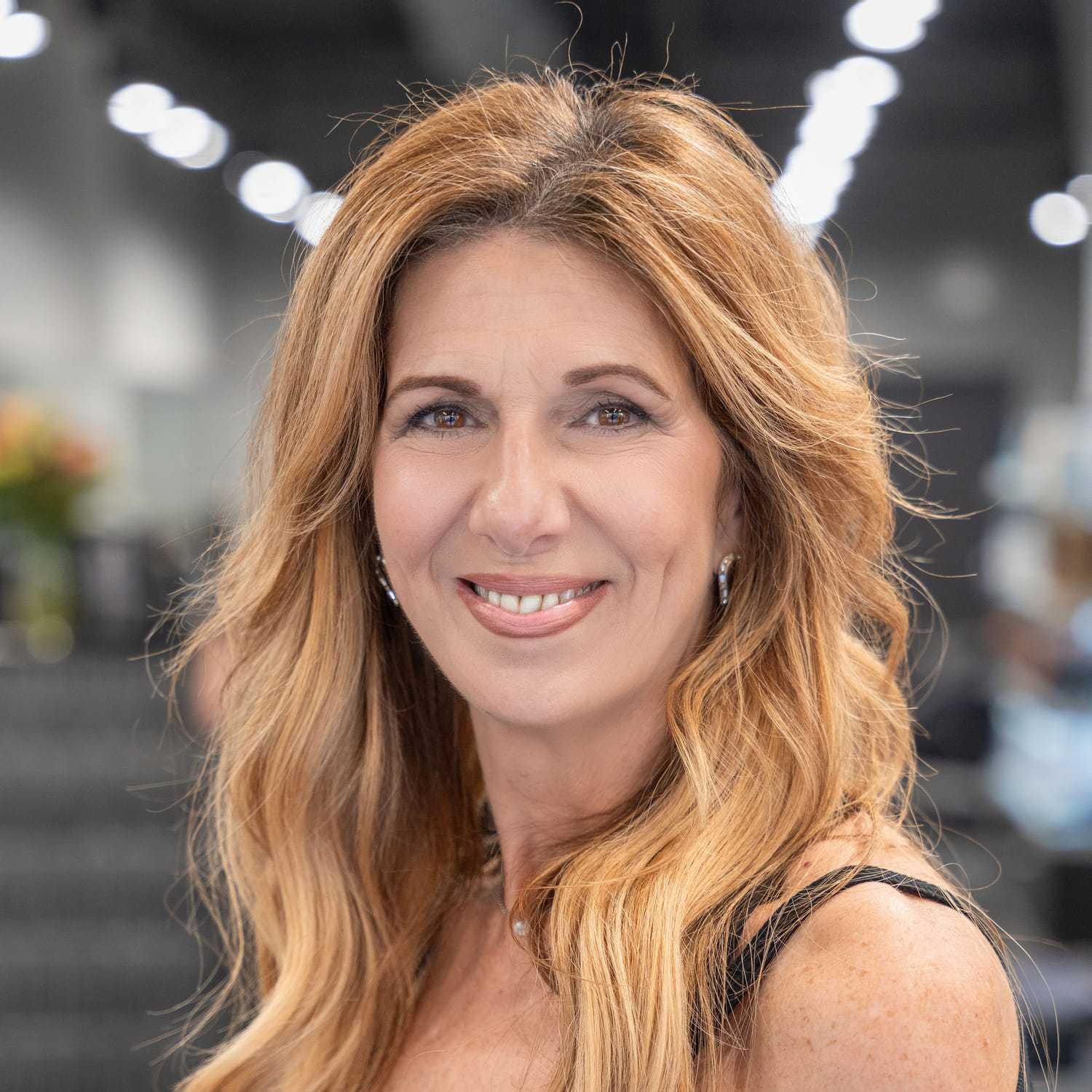 Portrait of Meg Smith, a professional stylist at Jason Matthew Salon, showcasing their expertise and style.