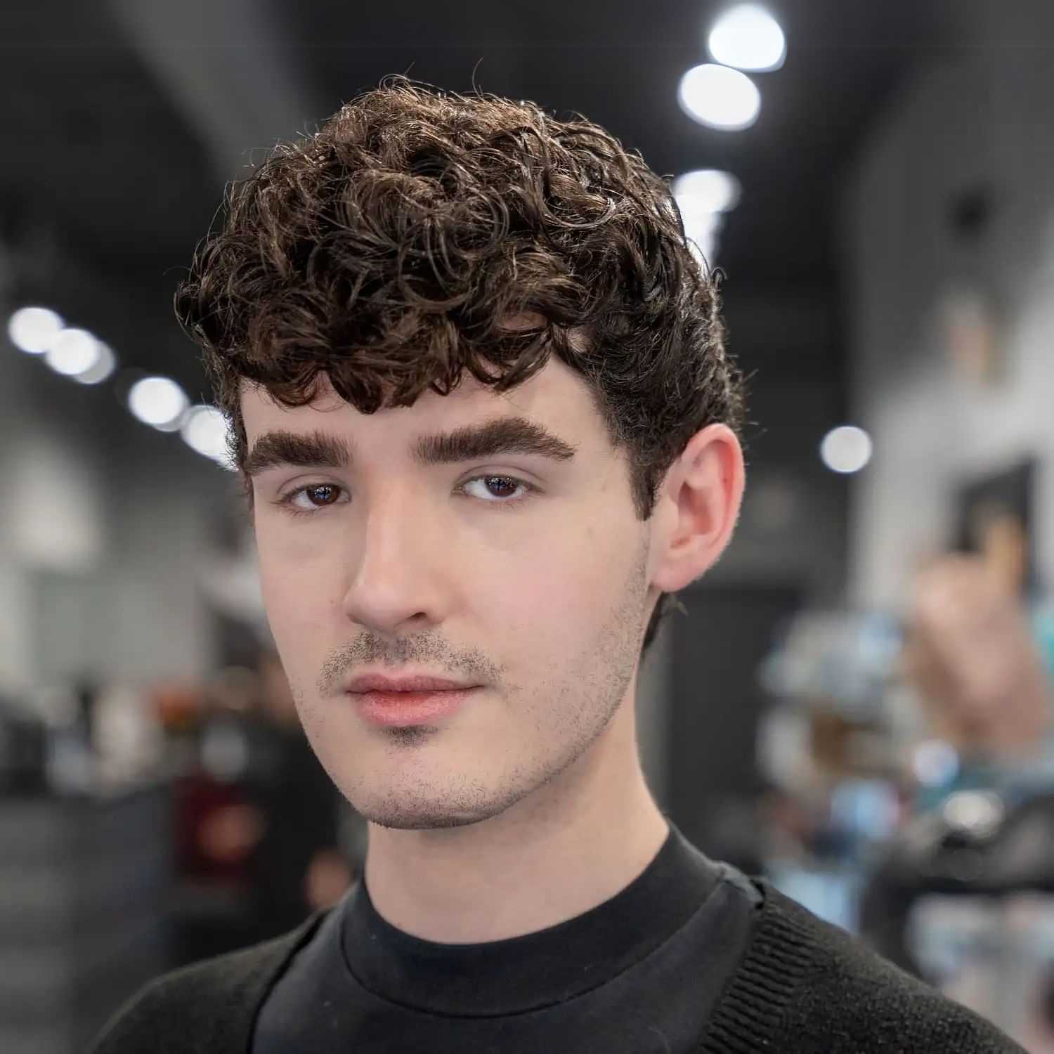 Portrait of Shane Gallagher, a professional stylist at Jason Matthew Salon, showcasing their expertise and style.