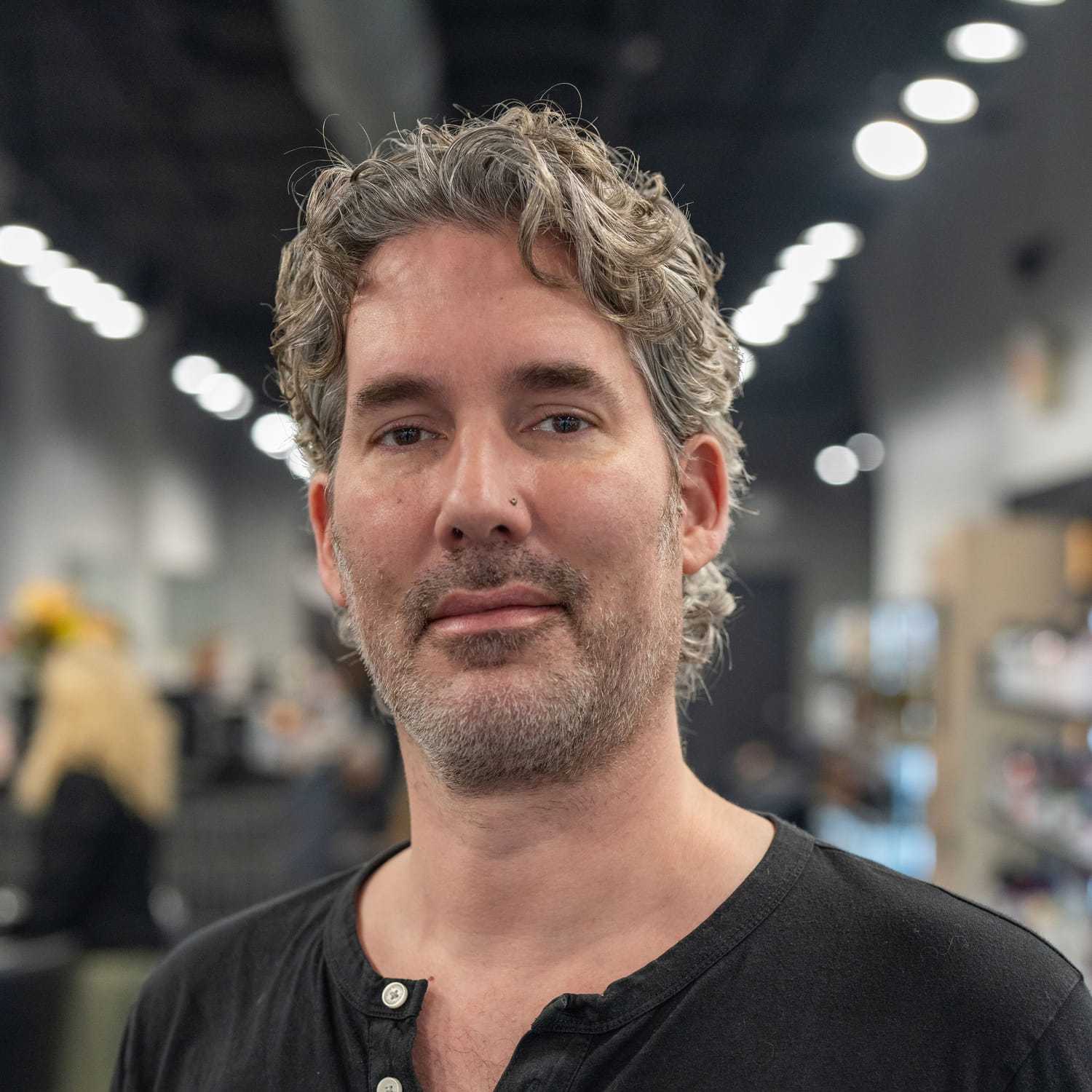 Portrait of Jason Sparks, a professional stylist at Jason Matthew Salon, showcasing their expertise and style.