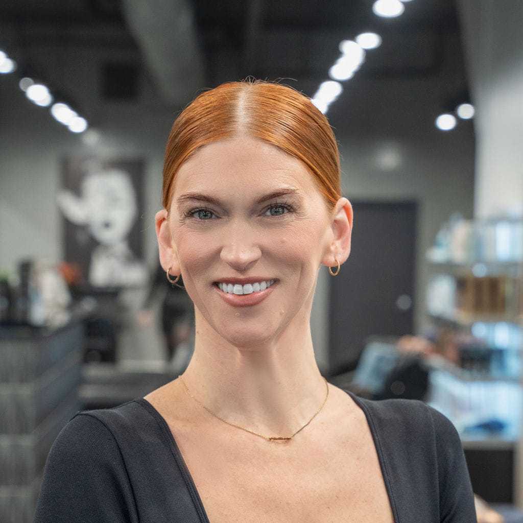 Portrait of Melissa Stein, a professional stylist at Jason Matthew Salon, showcasing their expertise and style.
