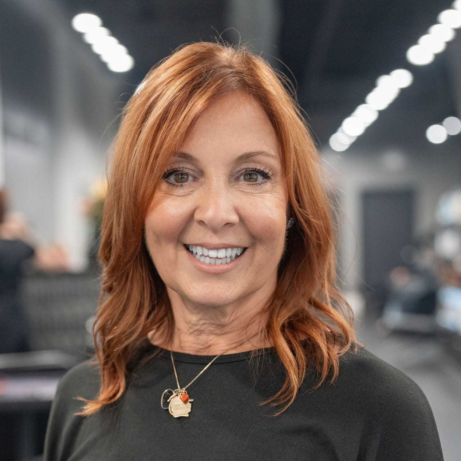 Portrait of Vicki Scott, a professional stylist at Jason Matthew Salon, showcasing their expertise and style.